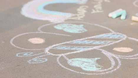 as the chalk drawing comes to life, it becomes a moment frozen in time