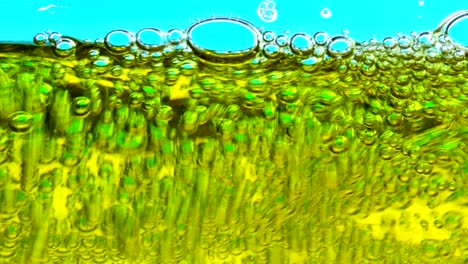 water oil bubbles  behind glass background