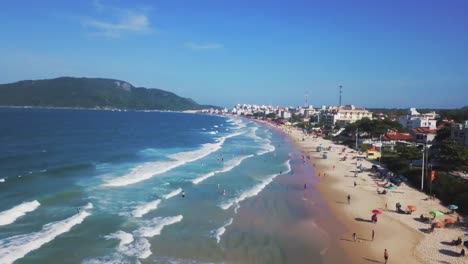 aerial drone moving forward trough brazilian beach in summer