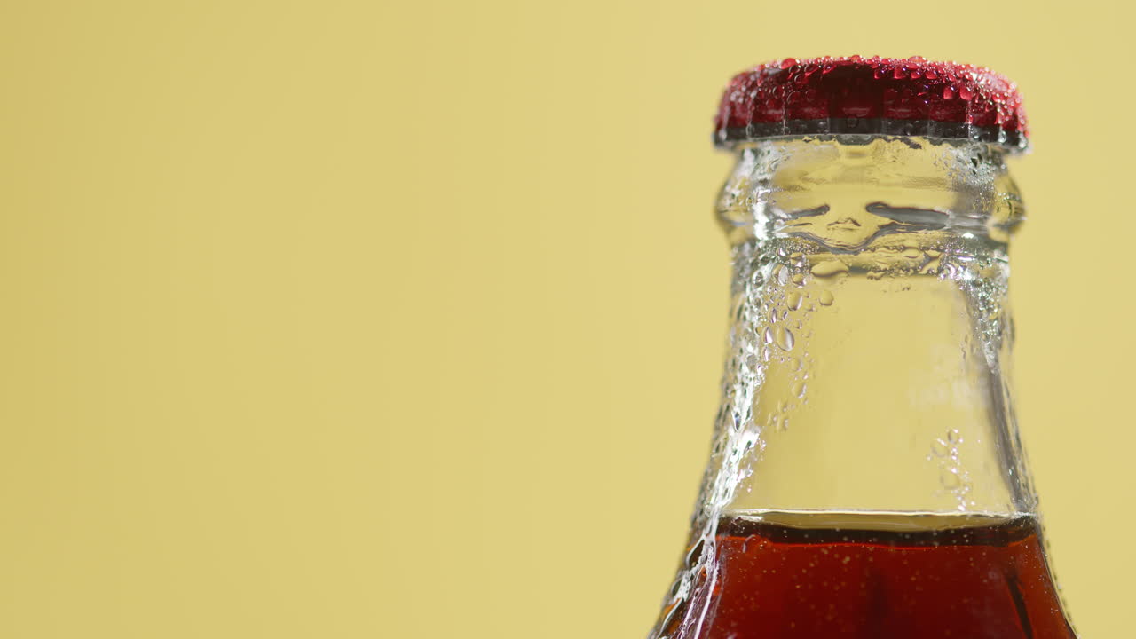Close Up Of Condensation Droplets On Neck Of Bottle Of Cold Beer Or Soft Drink With Metal Cap 2