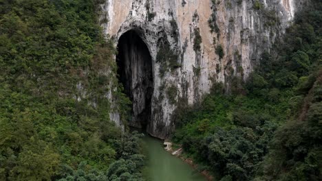 Amazing-karst-mountain-cave-arch-formation-in-China,-Great-Arch-of-Getu,-aerial