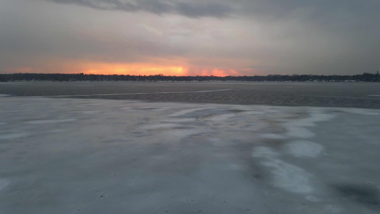 Patterns in nature, aerial view of a frozen lake with cool forms on the ice Nature