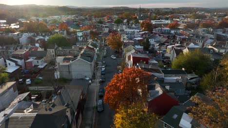 aerial establishing shot of residential inner city homes in urban american town