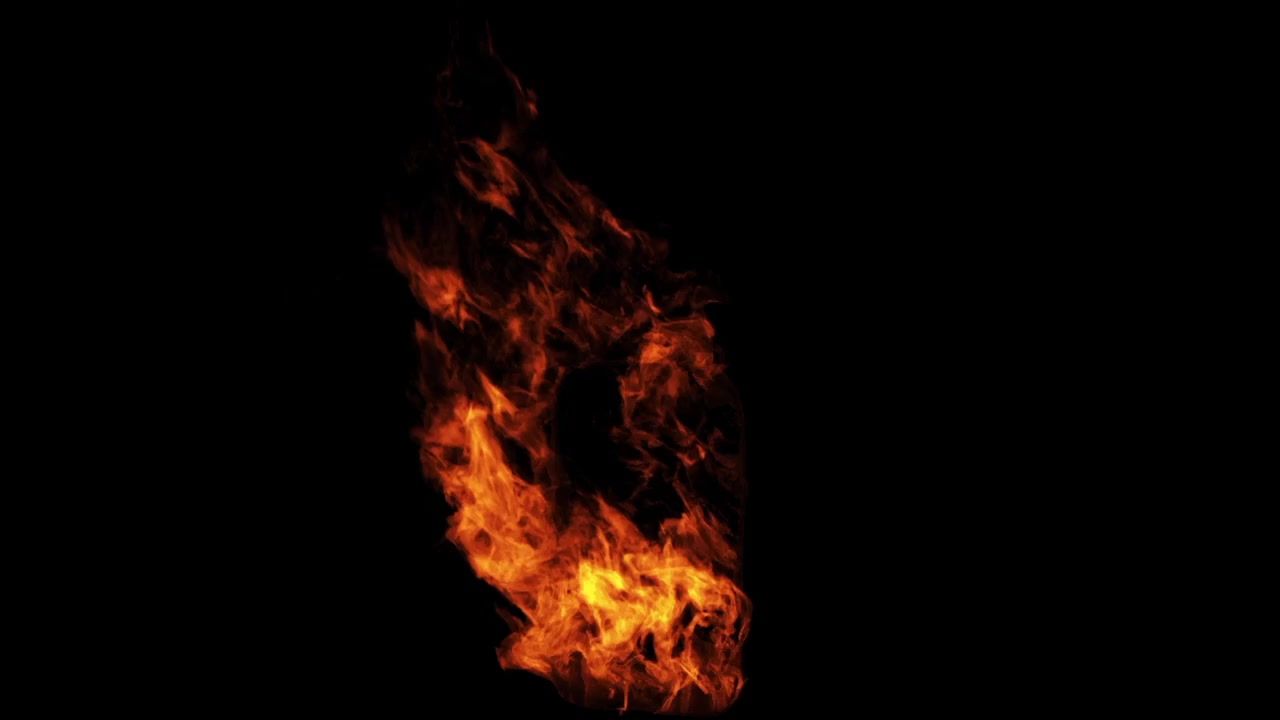 Isolated Fire Flame Bursting Against Black Background