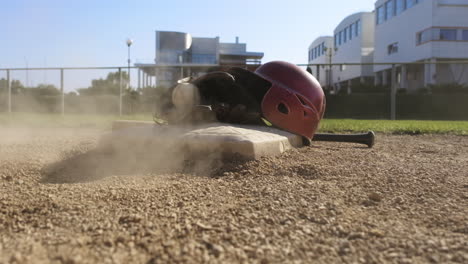 essential baseball gear you will find on the field helmet glove ball and bat