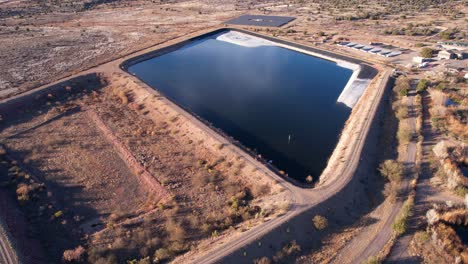 Aerial-View-of-Sedona-Wetlands-Preserve-and-Wastewater-Treatment-Facility-Pond,-Arizona-USA,-Drone-Shot