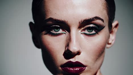 close-up portrait of a woman with vibrant makeup