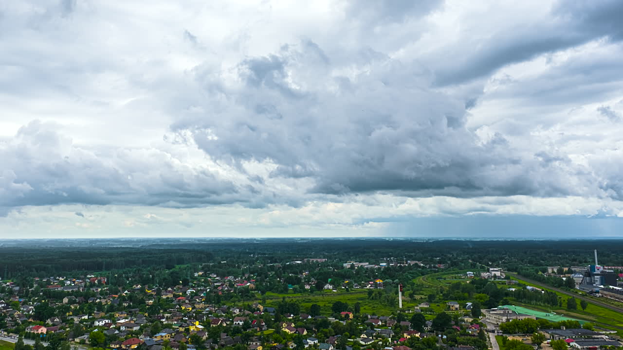 Dramatic clouds over cityscape in a fast-paced hyperlapse view