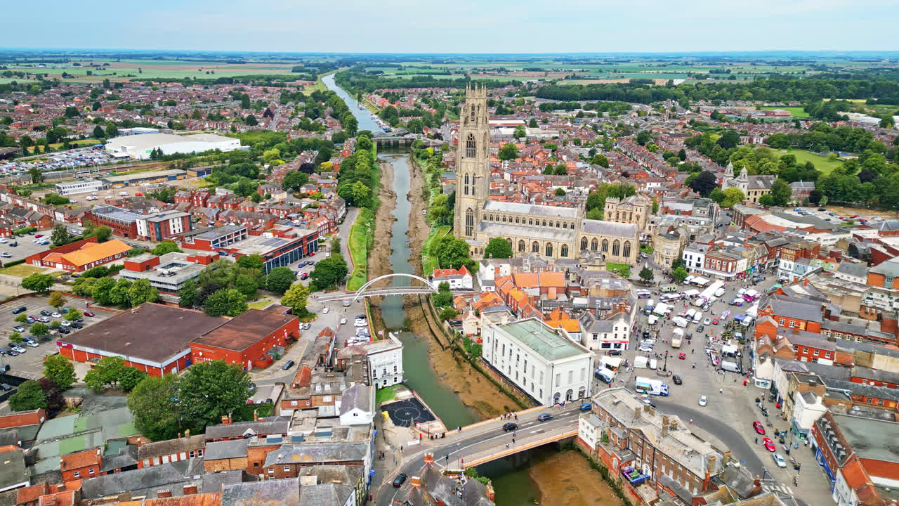 scenic beauty of Boston, Lincolnshire, in mesmerizing aerial drone footage: Port, ships, Saint Botolph Church , Saint Botolph's Bridge
