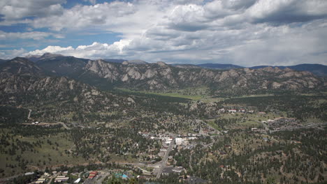 pan of small tourist mountain town in colorado from high above