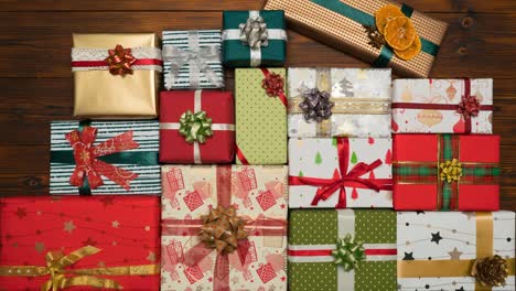 gifts falling from above on dark wooden background