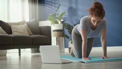 Static-video-of-woman-exercising-on-exercise-mat