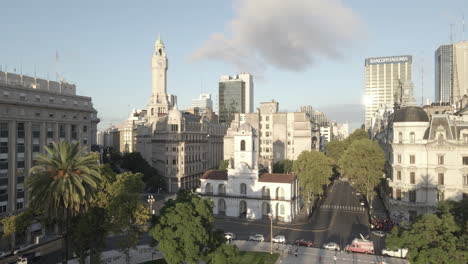 Aerial-Drone-flying-back-Cabildo-building-revealing-Buenos-Aires-cityscape,-Argentina