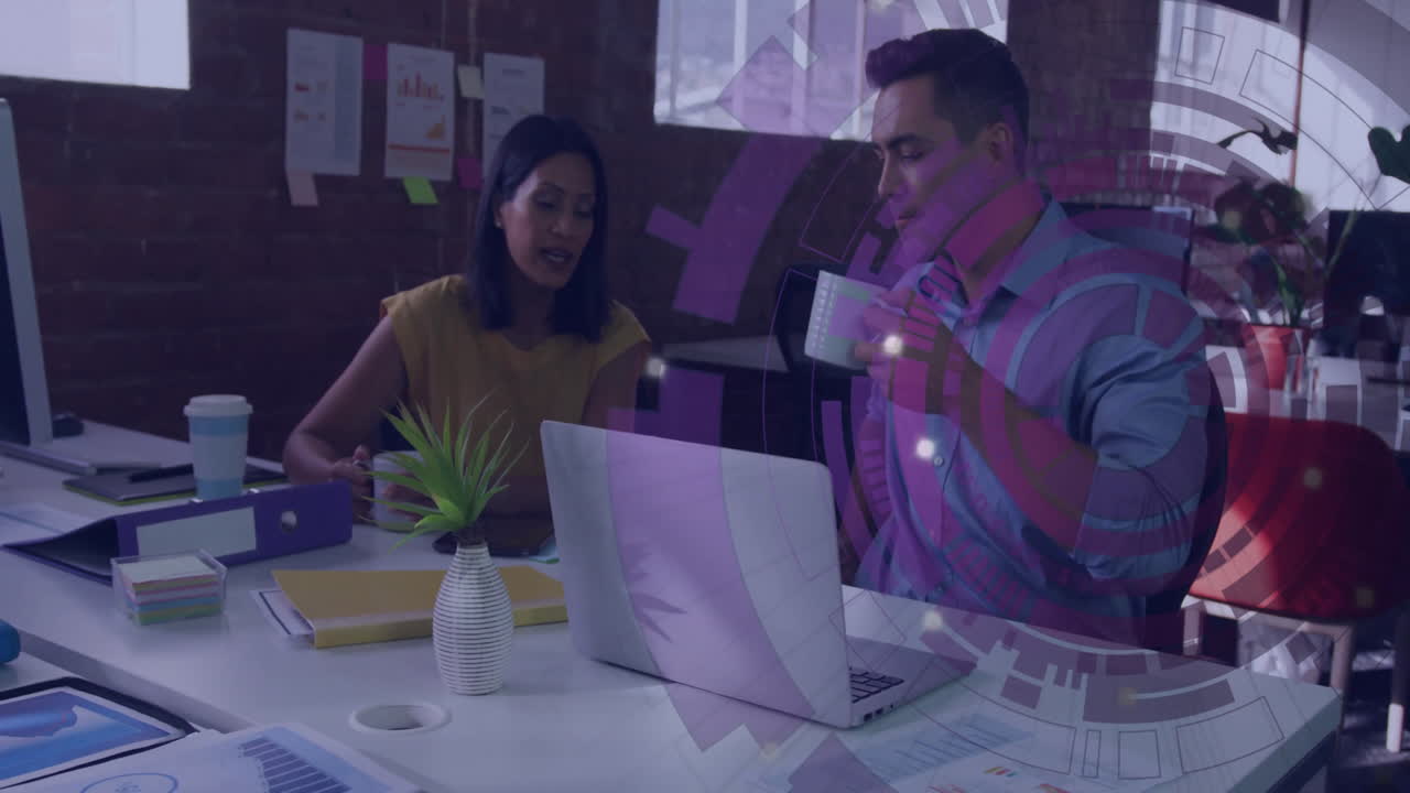 Business people discussing at desk with digital data processing animation overlay