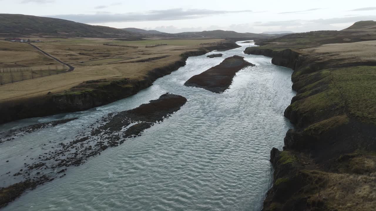 Aerial View of a Serene River Valley in Iceland