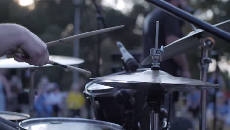 drums being played for a live concert at sunset