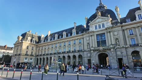 timelapse motion lapse of people in republic square or place de la republique on sunny day, rennes in france. panning