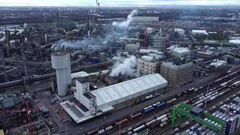 shipping terminal of rail-sided chemical plant complex, drone view