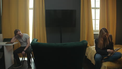 couple relaxing in a modern bedroom