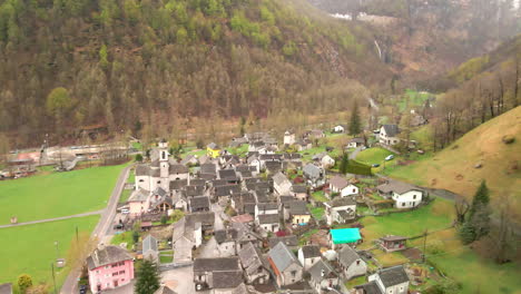 aerial view over the village of sonogno in verzasca valley near locarno, ticino canton, switzerland - drone shot