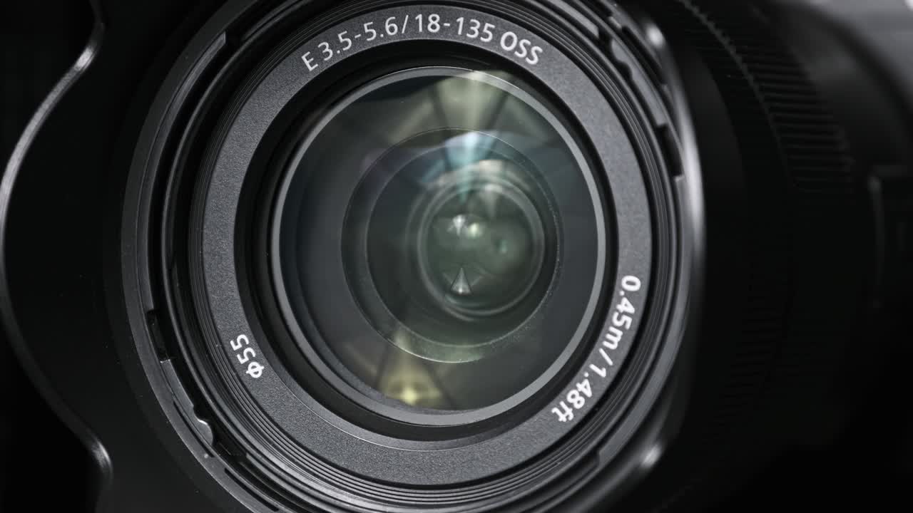 The Camera Lens Rotates, Lights Reflecting Off Glass, Robotic Camera Movement