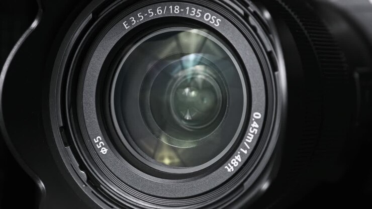 The Camera Lens Rotates, Lights Reflecting Off Glass, Robotic Camera Movement