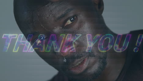 animation of thank you text over african american sportsman at gym