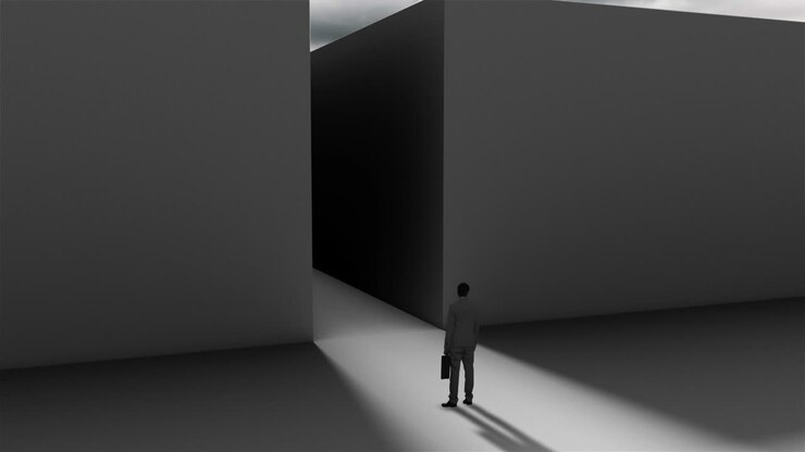 Businessman at entrance of maze