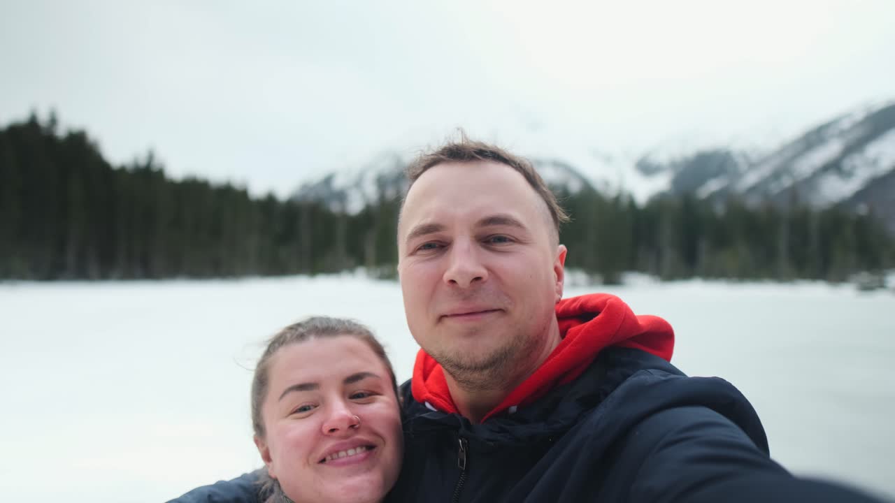 Happy Couple on a Snowy Winter Vacation
