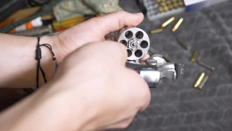 60p-slomotion: drawing revolver from leather holster and checking it is clear