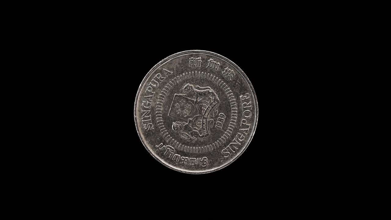 Singapore 10 cent 1989 obverse with national arms and ribbon upwards, macro loop on black background