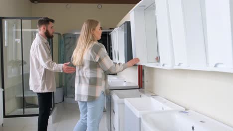 couple shopping for bathroom fixtures
