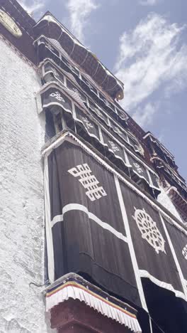 vertical view of potala palace, dzong-style architecture and cultural icon in tibet autonomous region