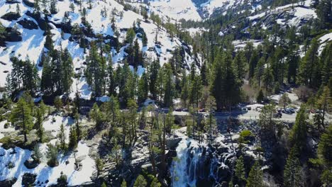Eagle-Falls,-Lake-Tahoe-aerial-view-above-stone-mountain-woodland-waterfalls-landscape