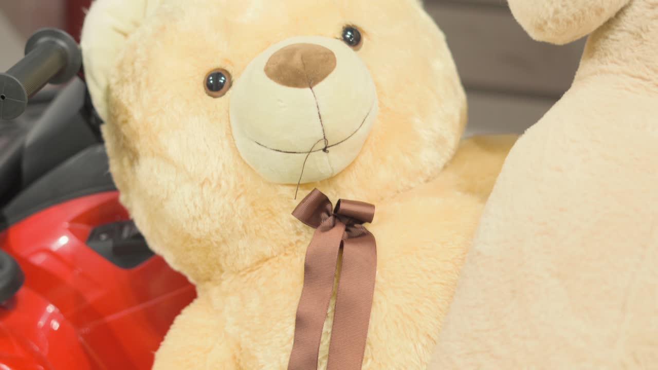 yellow colour teddy bear legs to face closeup view