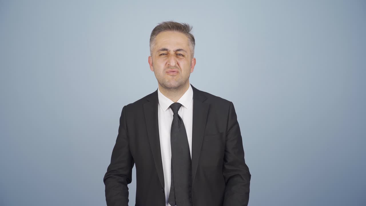 Businessman closing the file in anger.