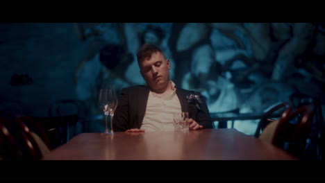 Sad Man in a Restaurant