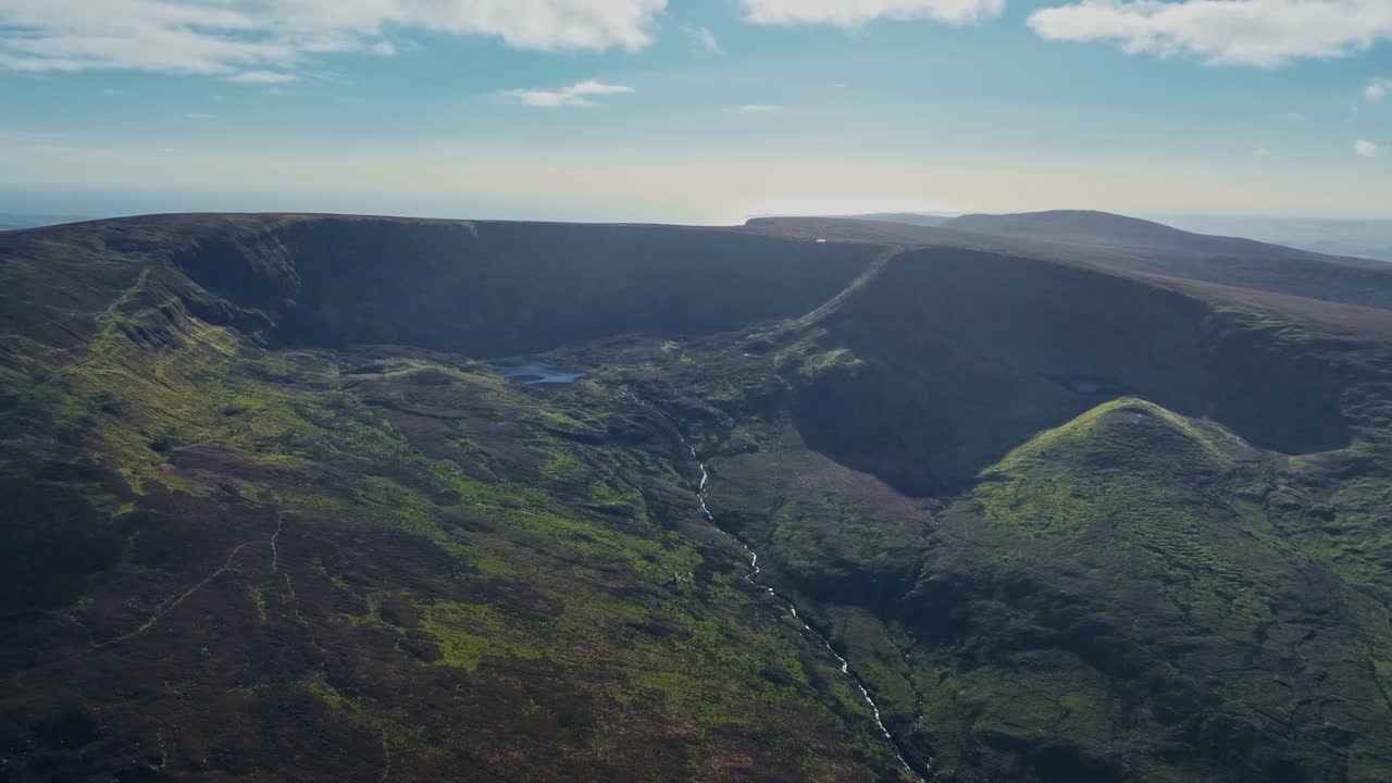 Ireland maintain landscape drone rising over Nire Lakes Comeragh Mountains Waterford Winter morning
