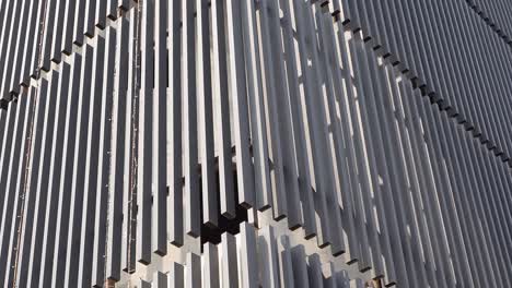 modern building facade with vertical metal panels