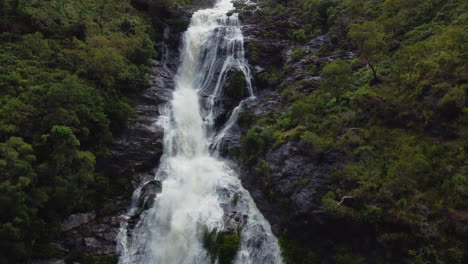 aerial view approaching huge colnett waterfall near hienghene, new caledonia