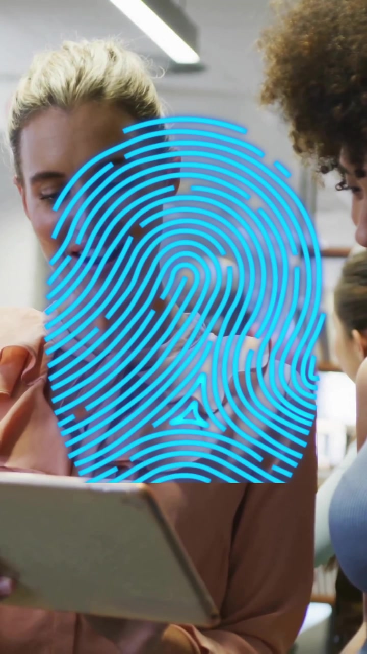 Animation of blue fingerprint over diverse colleagues talking in creative office