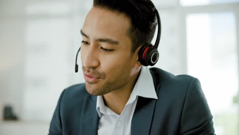 businessman wearing headset during a call