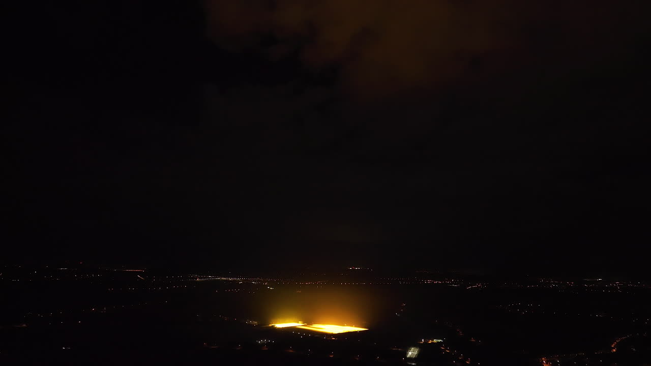Night Aerial View of Illuminated Runway