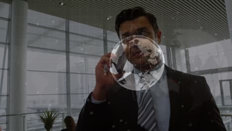 animation of globe with data processing over businessman using smartphone