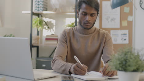 man working at a desk
