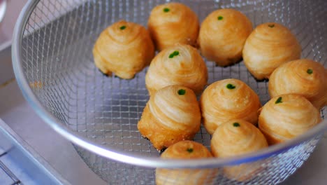 preparation of puff pastry dough for the fried chinese pastry.