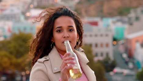 rooftop, city and woman drinking a beer alone