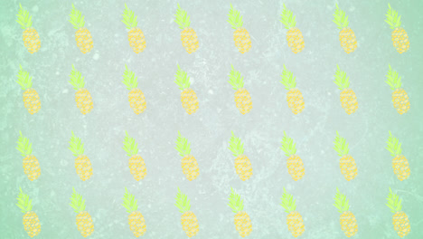 animation of pineapples moving on green background