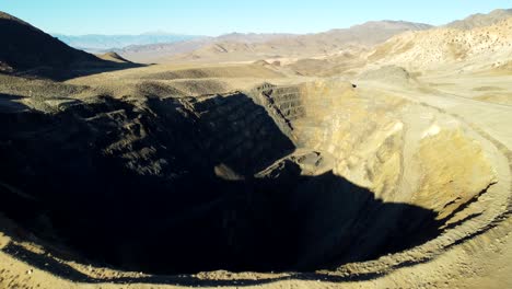 us, nv, luning, hwy 316, 2025-01-17 - drone view of an abandoned open pit mine at sunrise in the desert