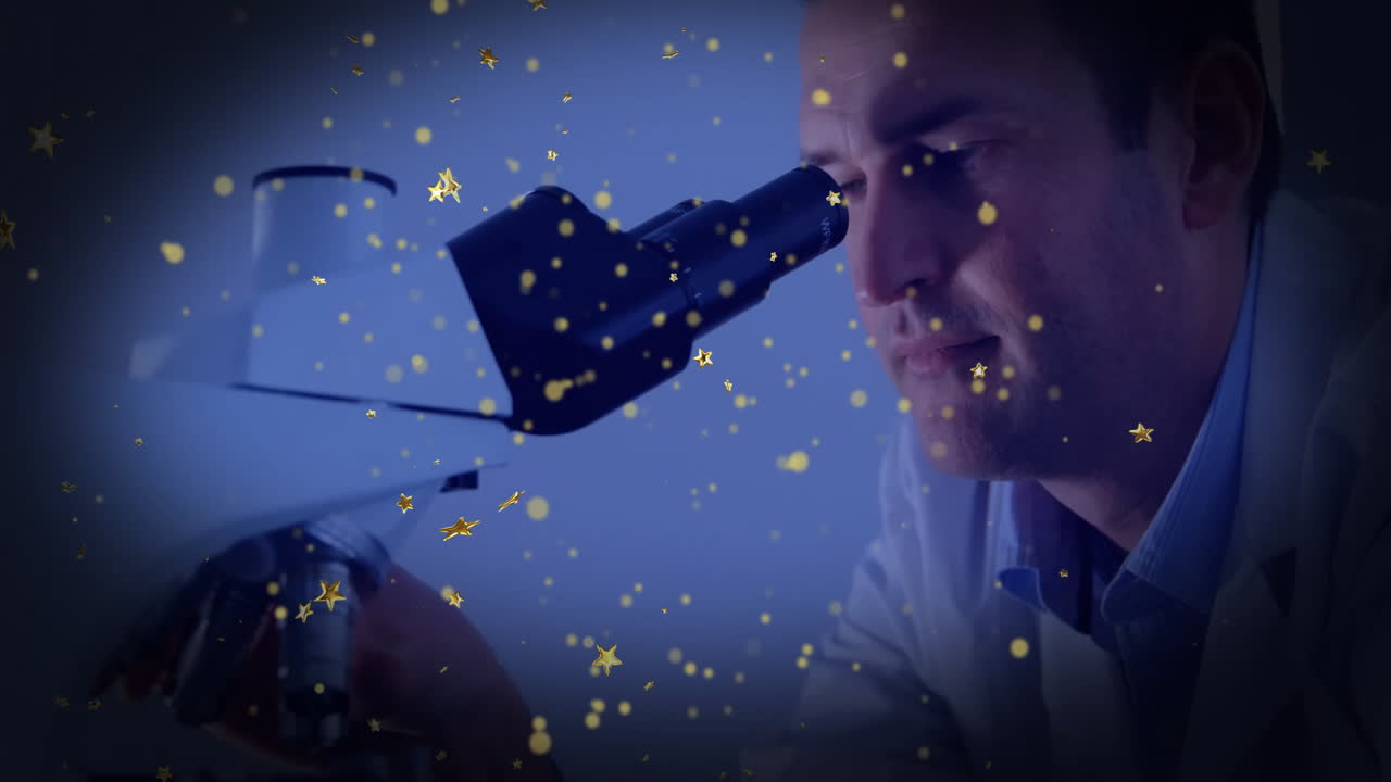 Male scientist examining sample under microscope in tech lab, displaying golden sparkles
